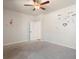 Neutral bedroom with a ceiling fan and decals on the wall at 514 Eagles Pt, Fairburn, GA 30213