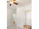 Bedroom with neutral carpet and paint and ceiling fan at 514 Eagles Pt, Fairburn, GA 30213