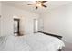 Bedroom boasts a comfortable bed, carpeted floors, and natural light at 514 Eagles Pt, Fairburn, GA 30213