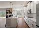 Spacious kitchen featuring a large island, modern appliances, and seamless access to living area at 514 Eagles Pt, Fairburn, GA 30213