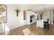 Modern kitchen with white cabinets, island seating, and stainless steel appliances at 514 Eagles Pt, Fairburn, GA 30213