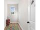 Bright room with wood floors, window and fun rug, perfect for ' play at 514 Eagles Pt, Fairburn, GA 30213