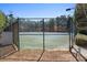 Fenced tennis courts for a healthy outdoor lifestyle in a private community at 514 Eagles Pt, Fairburn, GA 30213