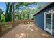 Spacious back deck with wooden railing offering views of the backyard at 1052 Donnelly Sw Ave, Atlanta, GA 30310