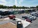 Aerial view of commercial buildings with Gusto, Costa Coffee, and ample parking at 1052 Donnelly Sw Ave, Atlanta, GA 30310