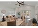 Bright living room featuring vaulted ceilings, and french doors to a deck at 1052 Donnelly Sw Ave, Atlanta, GA 30310