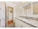 Bathroom featuring a granite countertop, and tile flooring at 1716 N Springs Dr, Atlanta, GA 30338