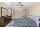 Comfortable bedroom with a large closet, hardwood floors, and natural light at 1716 N Springs Dr, Atlanta, GA 30338