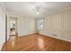 Bedroom with hardwood floors, trim, and natural lighting at 1716 N Springs Dr, Atlanta, GA 30338