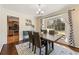 Cozy dining room with a large window and neutral decor at 1716 N Springs Dr, Atlanta, GA 30338