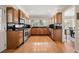 Well-equipped kitchen with stainless steel appliances and hardwood floors at 1716 N Springs Dr, Atlanta, GA 30338