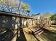 Backyard view showcases multi-level wood deck, adding character and space for outdoor enjoyment at 3252 Westbrook Trce, Lawrenceville, GA 30044