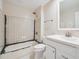 Tiled bathroom with white vanity, shower, and sink at 3252 Westbrook Trce, Lawrenceville, GA 30044