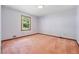 Bedroom featuring a window with green tree views and a closet for storage at 3252 Westbrook Trce, Lawrenceville, GA 30044