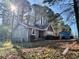 Inviting exterior of a well-maintained home with a stone facade and lush green surroundings at 3252 Westbrook Trce, Lawrenceville, GA 30044