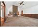 Spacious living room featuring a brick fireplace, large windows, and vaulted ceilings at 3252 Westbrook Trce, Lawrenceville, GA 30044