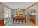 Open eat-in kitchen with dining table and french doors to the outside at 81 Summer Creek Dr, Dallas, GA 30157