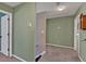 Hallway view with carpet flooring, a light, an entrance and doors at 81 Summer Creek Dr, Dallas, GA 30157