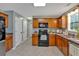 This large kitchen features ample counter space, shaker cabinets and stainless steel appliances at 81 Summer Creek Dr, Dallas, GA 30157