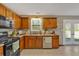 Charming kitchen featuring shaker cabinets, stainless steel appliances, and ample counter space at 81 Summer Creek Dr, Dallas, GA 30157