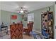 Office featuring ceiling fan, area rug and traditional shelving, and decorated with American flag art at 81 Summer Creek Dr, Dallas, GA 30157