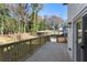 A wooden deck overlooking a lush backyard, perfect for outdoor entertaining at 1649 Derry Sw Ave, Atlanta, GA 30310