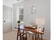 Bright home office featuring hardwood floors, a modern desk, and a window with natural light at 1649 Derry Sw Ave, Atlanta, GA 30310