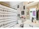 Cozy bathroom featuring framed quotes, patterned shower curtain, and neutral paint at 2883 Misty Rock Cv, Dacula, GA 30019