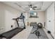 Basement gym with a ceiling fan, recessed lighting, a treadmill, and a weight rack at 2883 Misty Rock Cv, Dacula, GA 30019