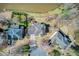Aerial view of three houses including the house for sale, showing their proximity to each other at 5529 Camden Lake Pointe Nw, Acworth, GA 30101