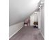 Finished attic space with neutral walls and plush gray carpet at 5529 Camden Lake Pointe Nw, Acworth, GA 30101