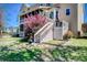 Well-maintained backyard with tiered porch, vibrant landscaping, and inviting outdoor space at 5529 Camden Lake Pointe Nw, Acworth, GA 30101