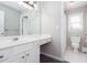Bright bathroom with neutral walls, white vanity, and separate toilet area at 5529 Camden Lake Pointe Nw, Acworth, GA 30101
