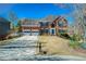 Charming two-story brick home with a two-car garage and a well-manicured front lawn at 5529 Camden Lake Pointe Nw, Acworth, GA 30101