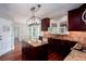 Updated kitchen with granite countertops, stainless steel appliances, large island, and hardwood floors at 5529 Camden Lake Pointe Nw, Acworth, GA 30101