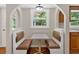 Cozy dining area featuring booth seating and natural light, perfect for meals at 9180 Shiloh Dr, Villa Rica, GA 30180