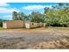Exterior view of the property, featuring a sprawling yard and ample space at 9180 Shiloh Dr, Villa Rica, GA 30180