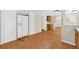 Kitchen featuring stainless steel refrigerator and wood floors at 9180 Shiloh Dr, Villa Rica, GA 30180