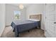 This bedroom has natural light, neutral colored walls, and comfortable carpet, making this a cozy place to rest at 114 Green Tree Ct, Dacula, GA 30019
