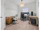 This home office has plenty of room for working, gaming, and creating with lots of natural light at 114 Green Tree Ct, Dacula, GA 30019
