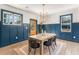 Stylish dining room showcasing a modern light fixture and views of the outdoors at 1453 Hartford Sw Ave, Atlanta, GA 30310