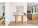 Bright entryway showcasing hardwood floors and access to the kitchen at 1453 Hartford Sw Ave, Atlanta, GA 30310