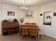 Cozy dining room featuring hardwood floors, a decorative chandelier, and ample natural light at 3191 Creston Park Ct, Duluth, GA 30096