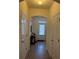 Inviting entryway with wood floors and neutral walls, leading to the main living areas of the home at 3191 Creston Park Ct, Duluth, GA 30096