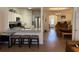 Open kitchen overlooking the dining and entry areas, featuring granite counters and stainless appliances at 3191 Creston Park Ct, Duluth, GA 30096