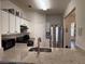 Granite countertop and stainless-steel appliances create a modern kitchen space at 3191 Creston Park Ct, Duluth, GA 30096