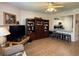 Spacious living area featuring hardwood floors and a view of the kitchen area at 3191 Creston Park Ct, Duluth, GA 30096