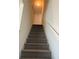 Carpeted staircase leading to the upper level with painted walls and trim at 3191 Creston Park Ct, Duluth, GA 30096