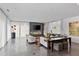 Modern living room with fireplace, sleek furniture, and floor-to-ceiling windows at 535 Forest Hills Ne Dr, Atlanta, GA 30342