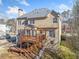 This home features a spacious rear deck and lots of windows at 1039 Ashfern Walk, Woodstock, GA 30189